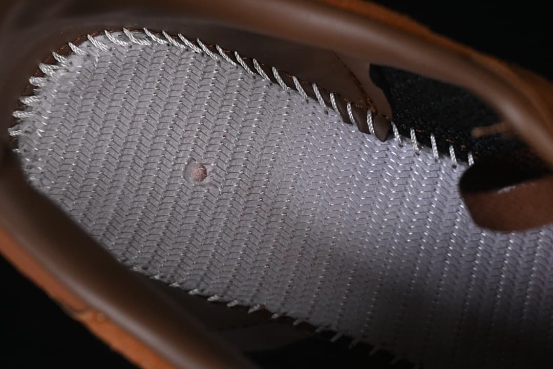 Close-up of the sneaker interior and insole stitching