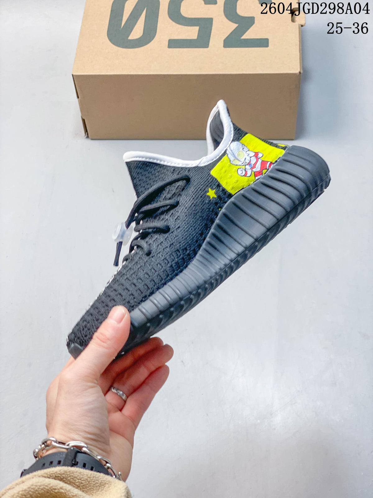 Side view of a charcoal sneaker with a ribbed sole and colorful graphics