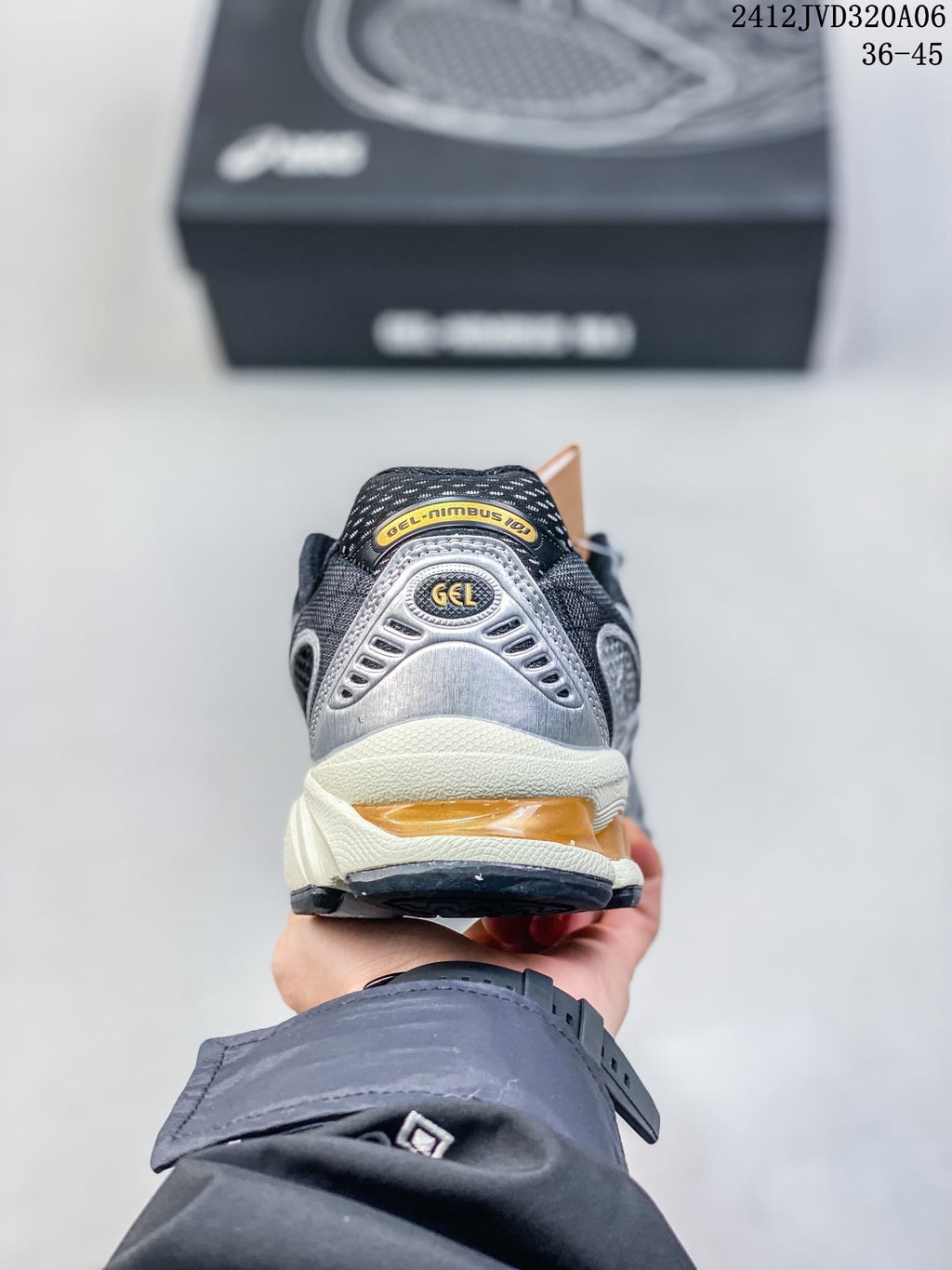 Rear view of the sneaker with silver heel detailing and off-white midsole
