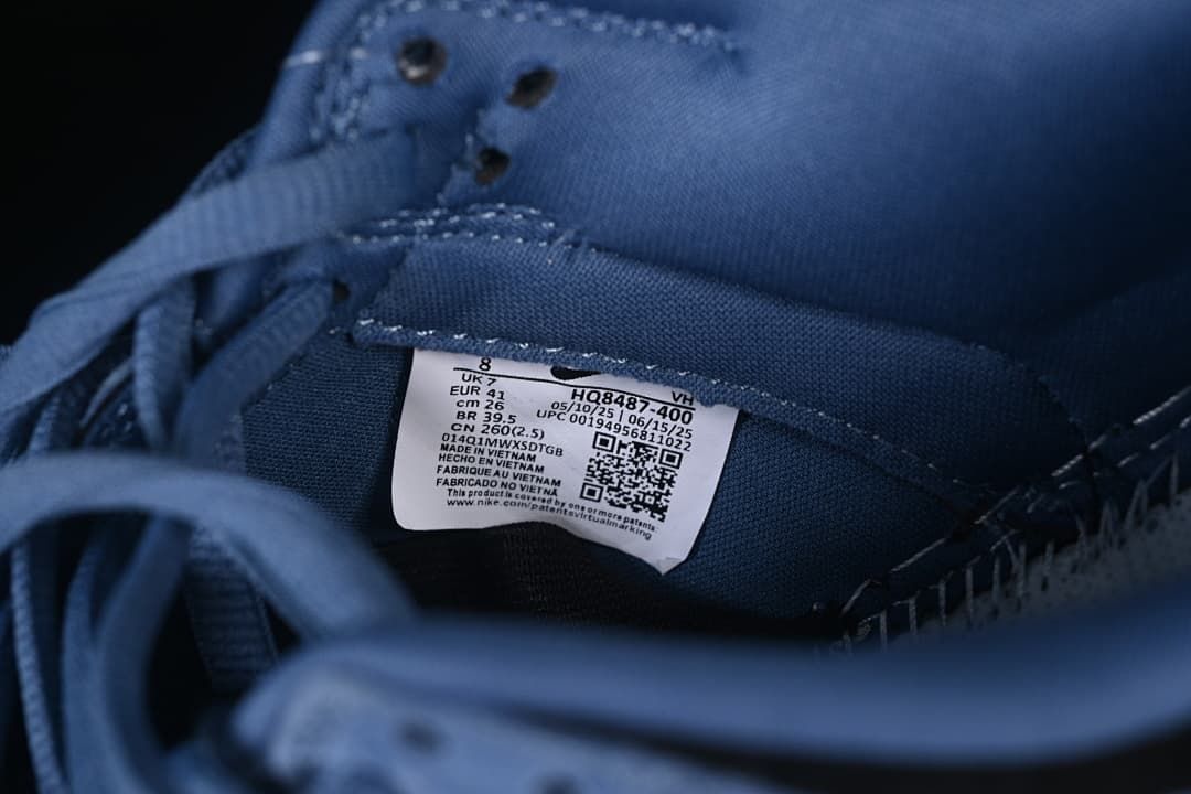 Close-up of the shoe size label showing EU 41 and style code HQ8487-400