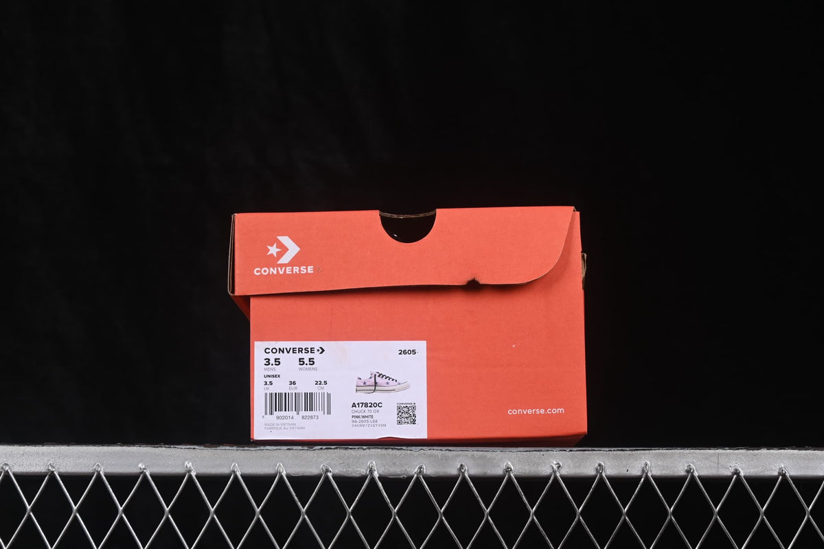 Converse shoe box with a visible product label showing Chuck 70 Ox, style code A17820C, and sample sizing.