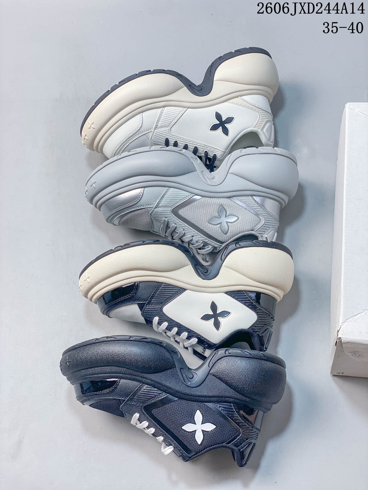 Four SMFK sneaker colorways arranged to show their soles and side panels