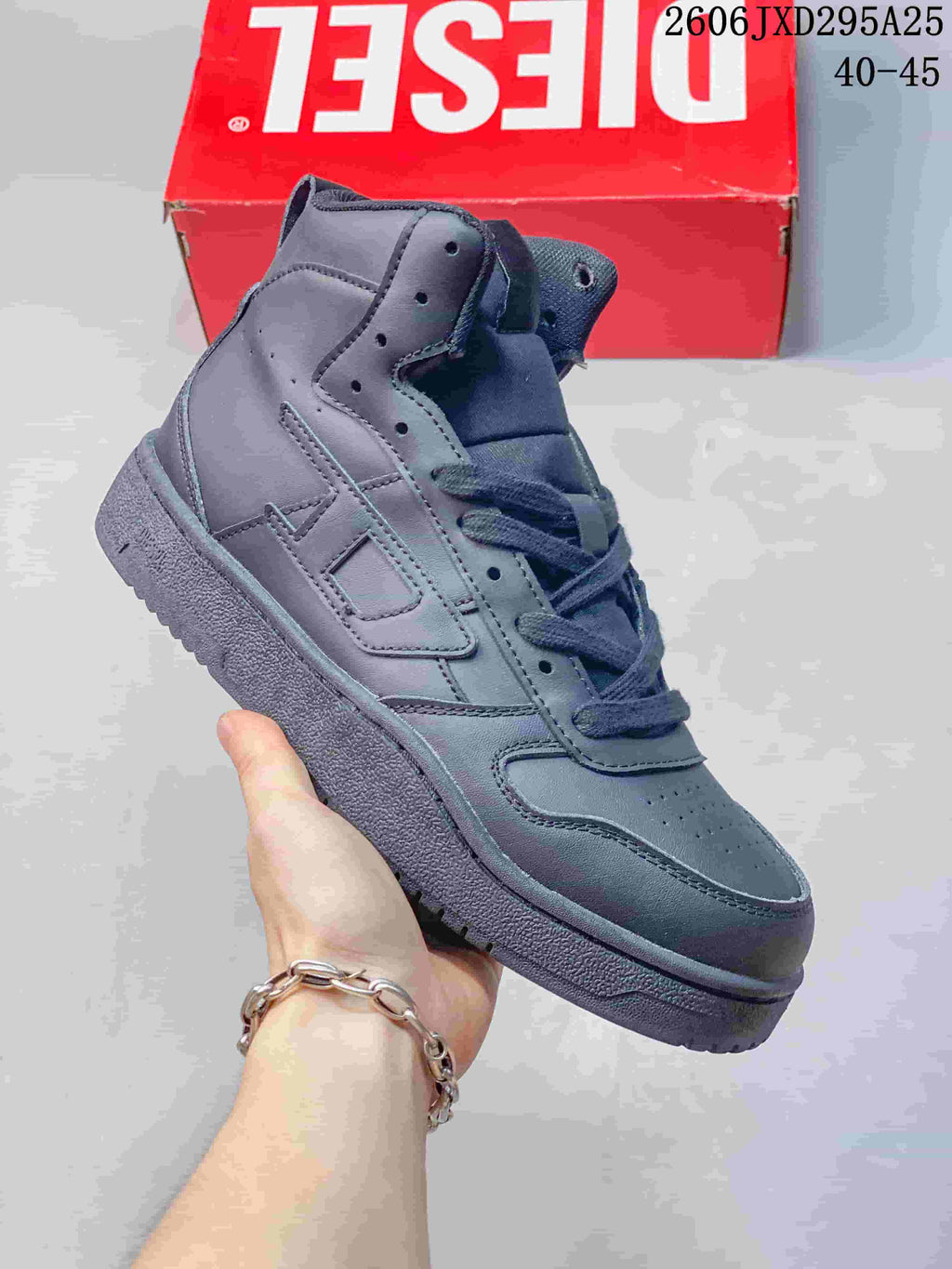 Dark gray Diesel S-Ukiyo high-top sneaker with matching laces and sole.