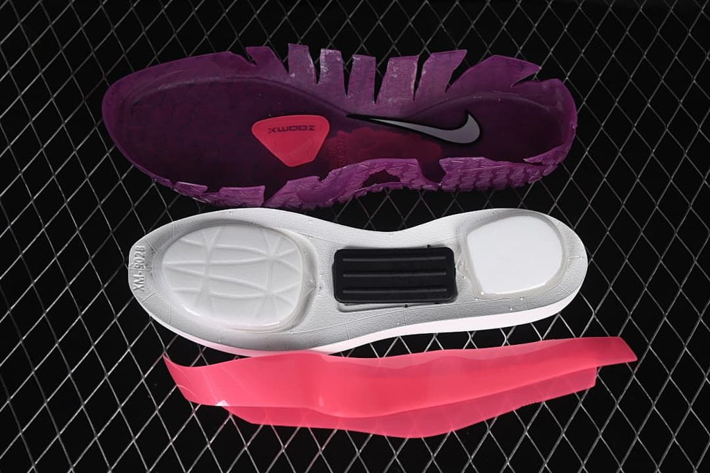 Exploded view showing the shoe outsole and midsole components