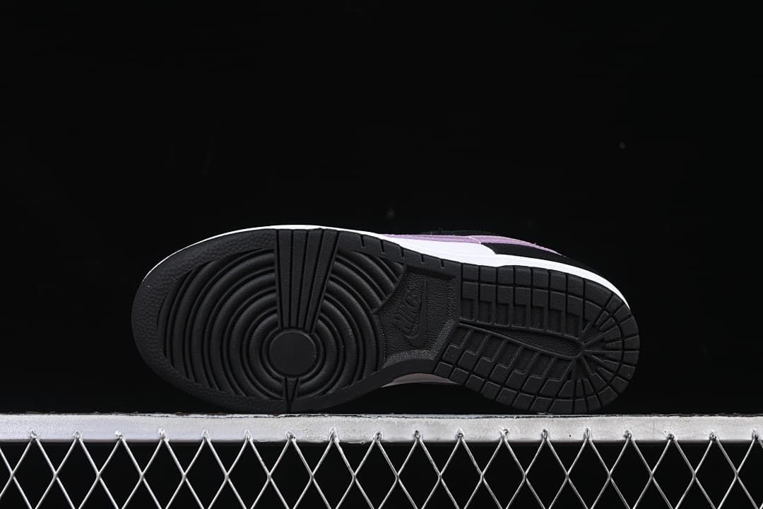 Underside view showing the black tread pattern