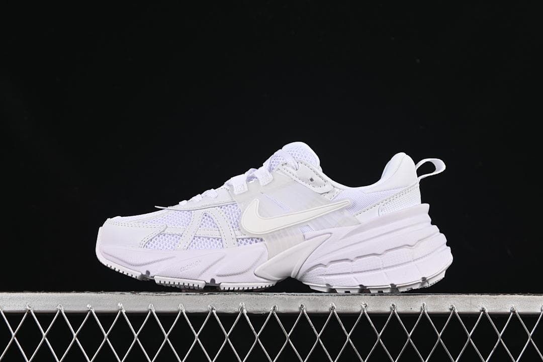 White Nike V2K Run sneaker shown in side profile.