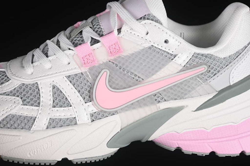 Close-up of the sneaker's side panels, laces, Swoosh, and sole