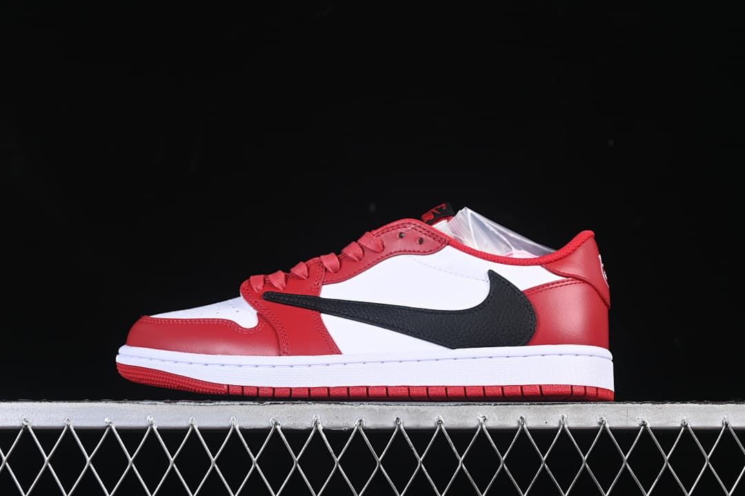 Side view of a red, white, and black Air Jordan 1 Low sneaker