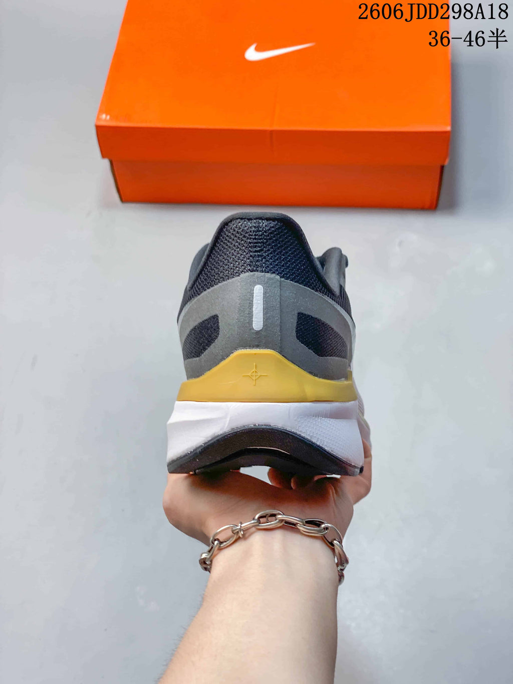 Rear view of the shoe showing the heel and layered midsole.