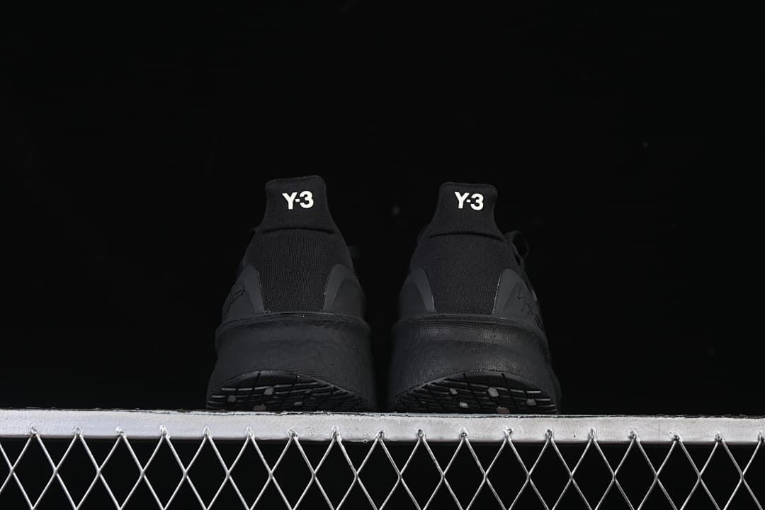 Rear view of the pair showing Y-3 heel tabs.