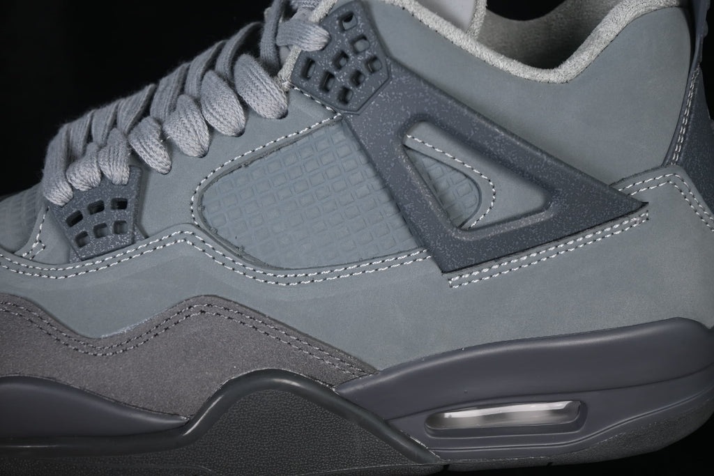 Close-up of the side mesh panel, molded lace support and midsole air unit.