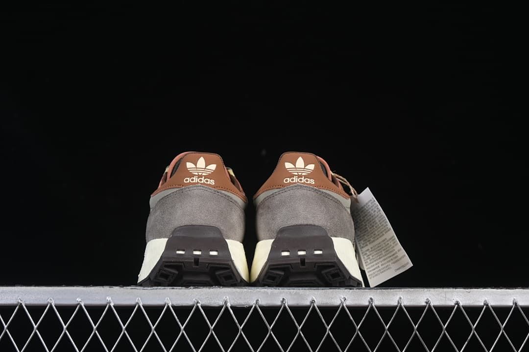 Rear view of both sneakers showing the heel details and outsoles