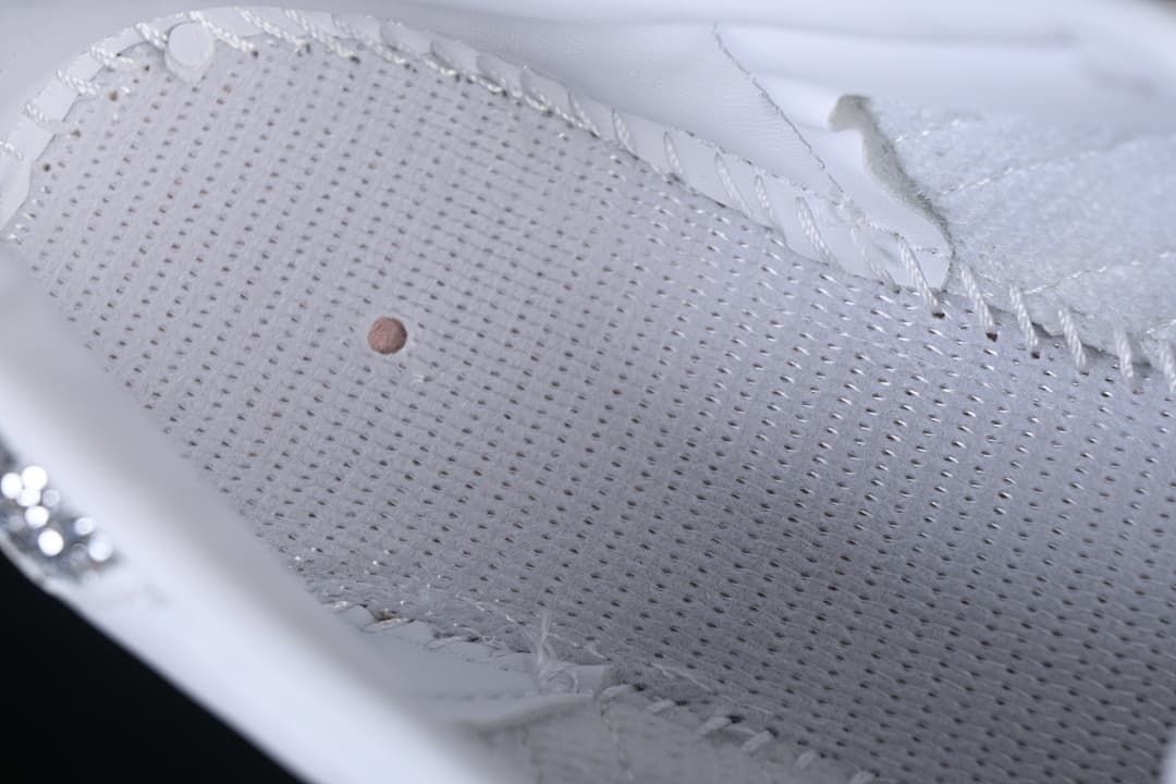 Close-up of the perforated interior of the sneaker.