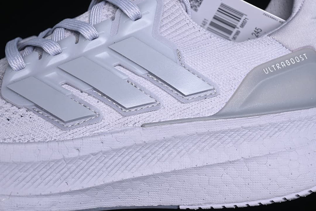 Close-up of the side support, knit-style upper, and midsole