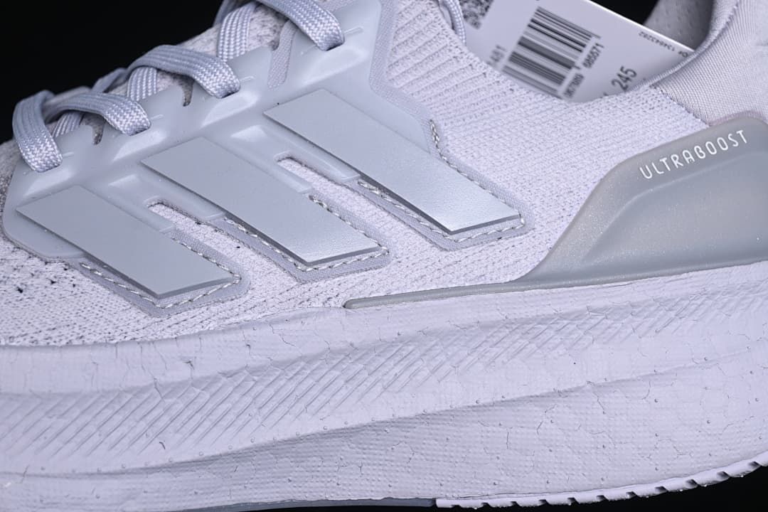 Close-up of the side support, knit-style upper, and midsole