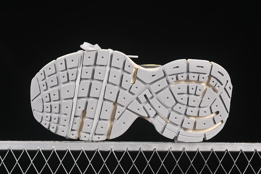 Underside view showing the segmented outsole tread