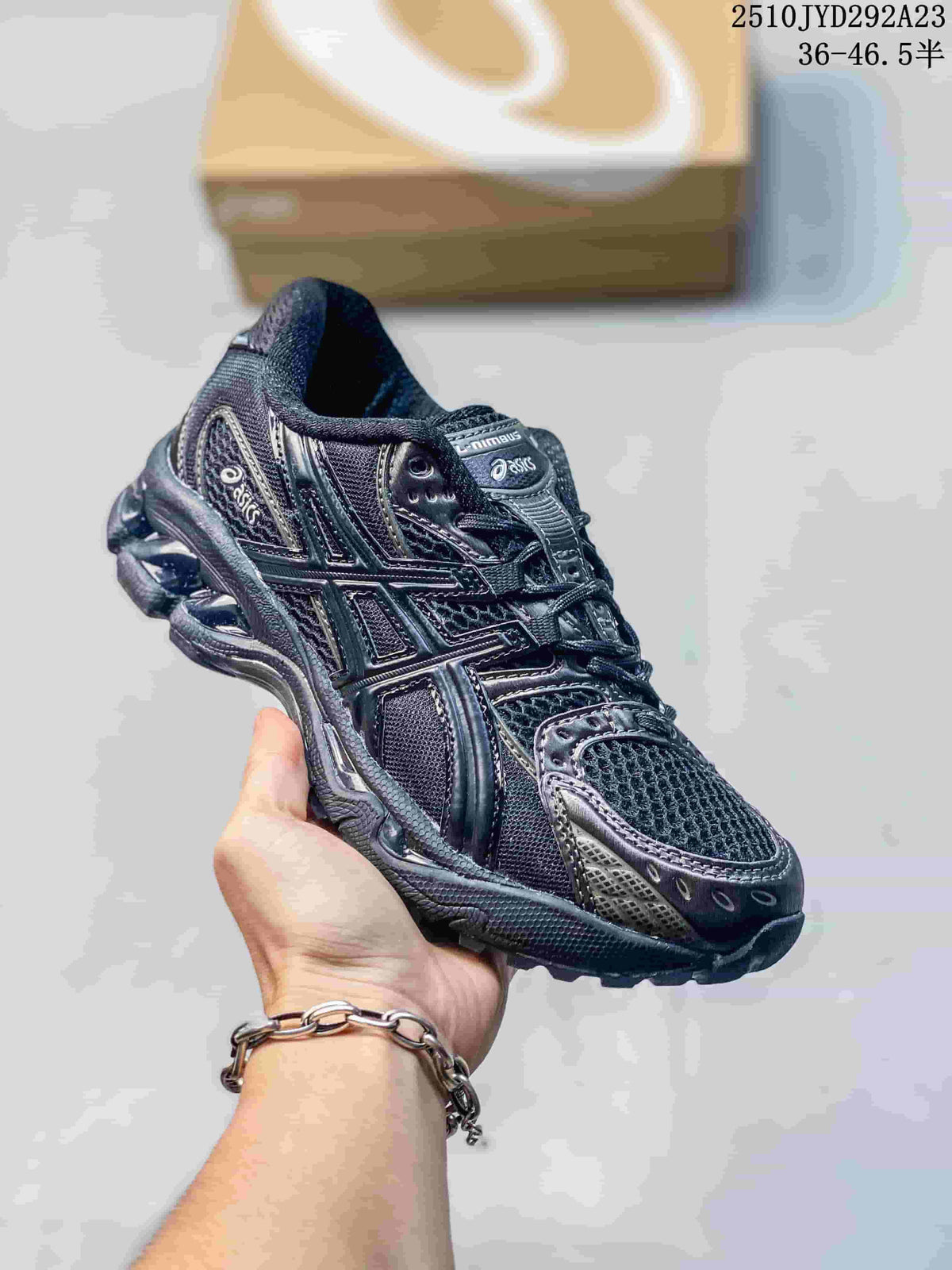 All-black ASICS Gel-Kayano 14 sneaker with layered mesh and overlays