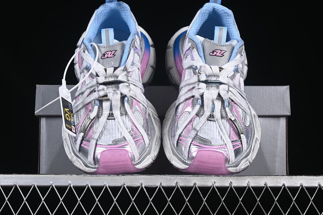 Front view of the pair showing pink toe details and blue lining