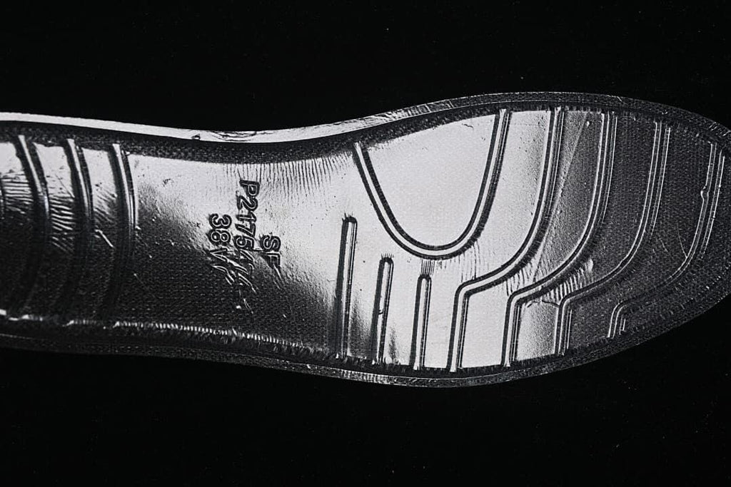 Close-up of the sneaker outsole with a size marking