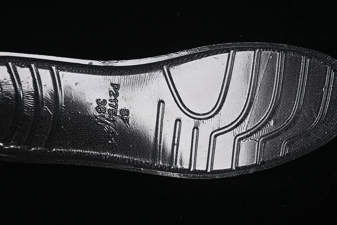 Close-up of the sneaker outsole with a size marking