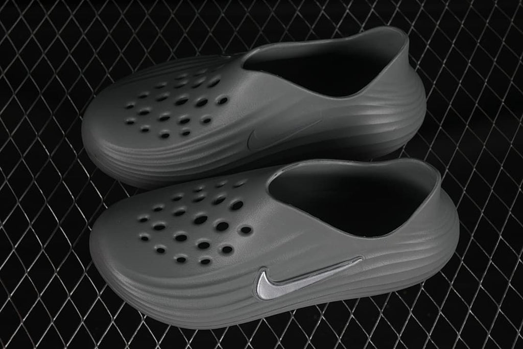 Pair of grey Nike ReactX Rejuven8 clogs shown from above and the side