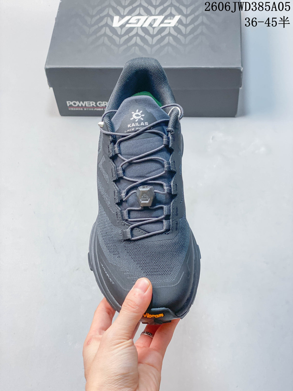 Front view highlighting the dial-adjustable laces and gray upper