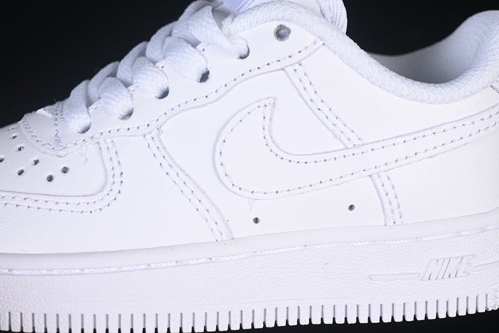 Close-up of the white side panels, stitching and swoosh