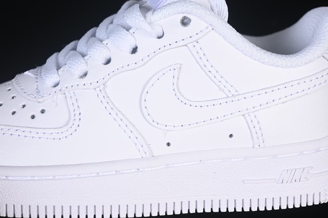 Close-up of the white side panels, stitching and swoosh