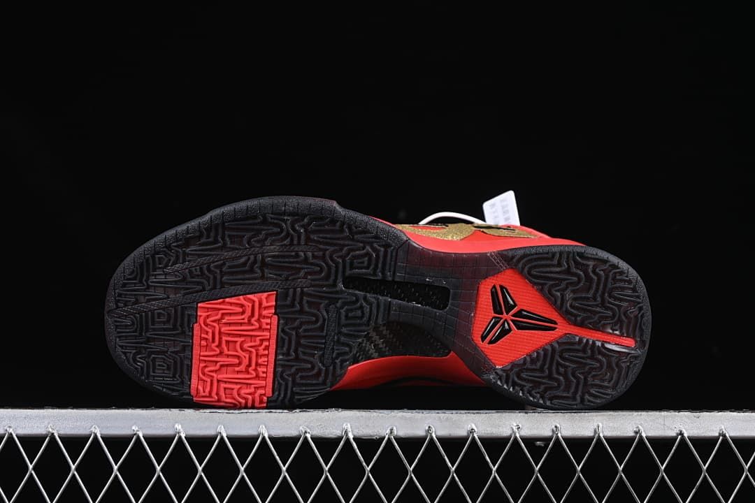 Black patterned outsole with red detailing