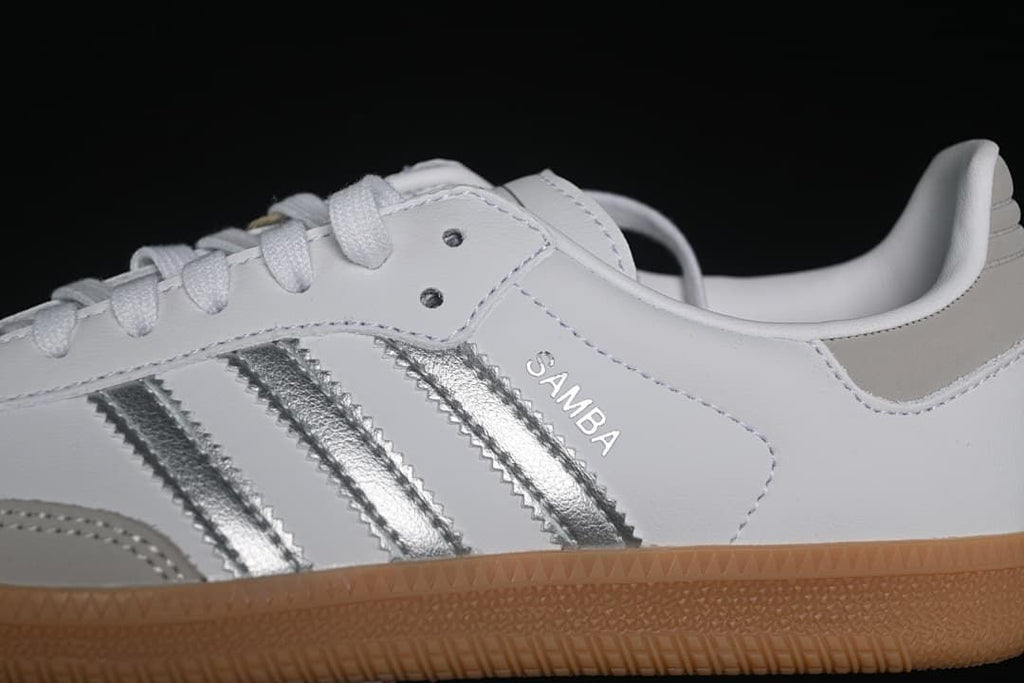 Close-up of silver side stripes and Samba lettering
