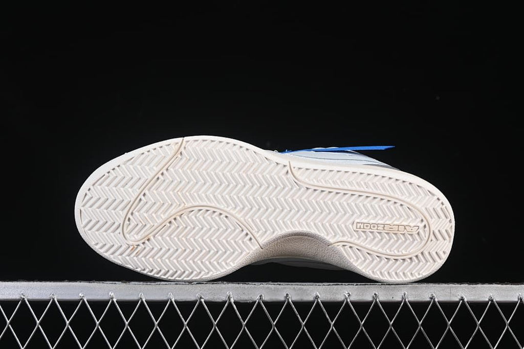 Underside view of the shoe with a herringbone-pattern outsole