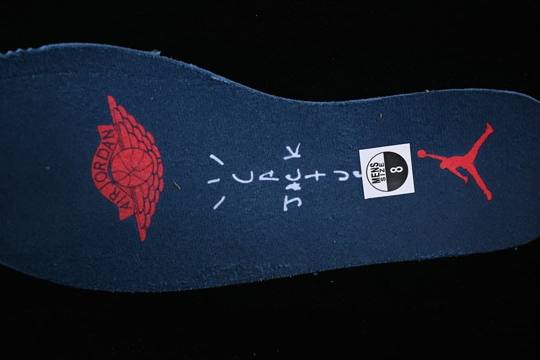 Insole showing a size sticker marked men's size 8 and red graphics