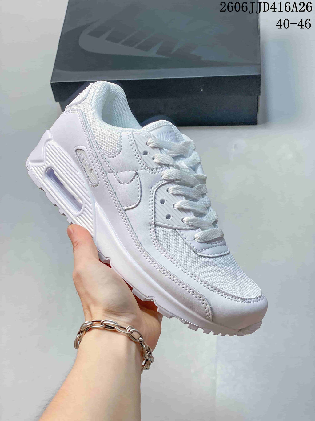 White Nike Air Max 90 sneaker with mesh panels and a windowed heel unit.