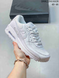White Nike Air Max 90 sneaker with mesh panels and a windowed heel unit.