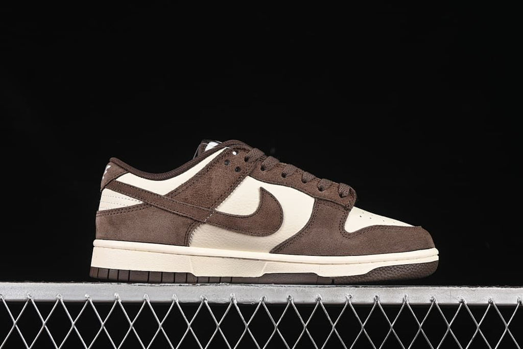 Side profile of a brown and off-white Nike SB Dunk Low