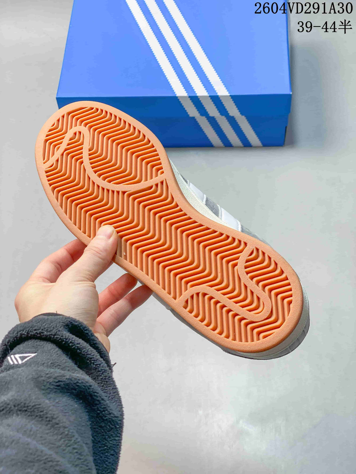 Gum-colored outsole with a patterned tread