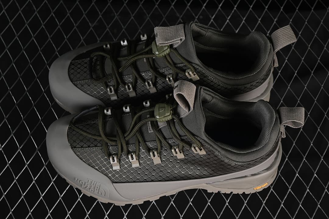 Pair of gray taupe low-cut sneakers viewed from above