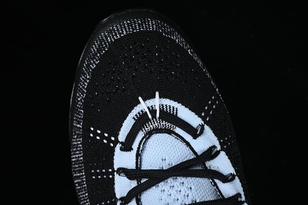 Top view highlighting the black knit toe and lace area.