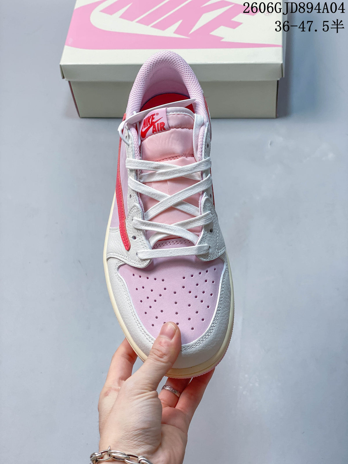Top view of the sneaker showing white laces and a perforated pink toe