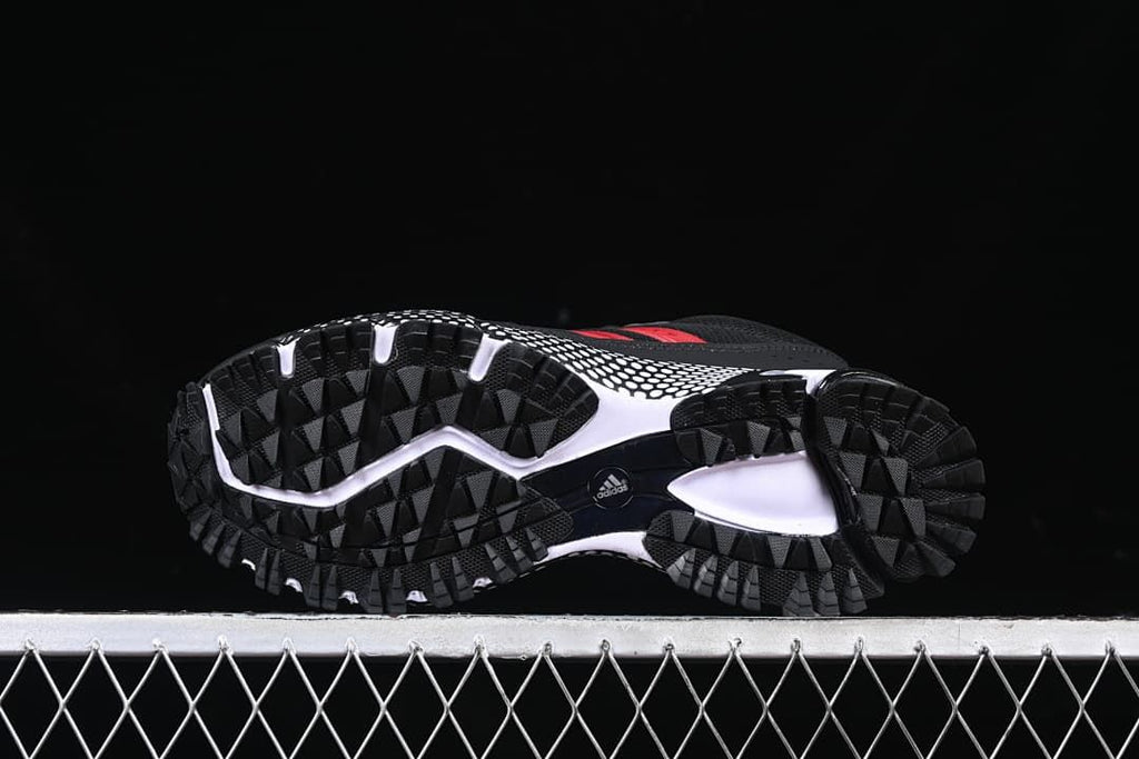 Underside view showing the lugged black outsole.