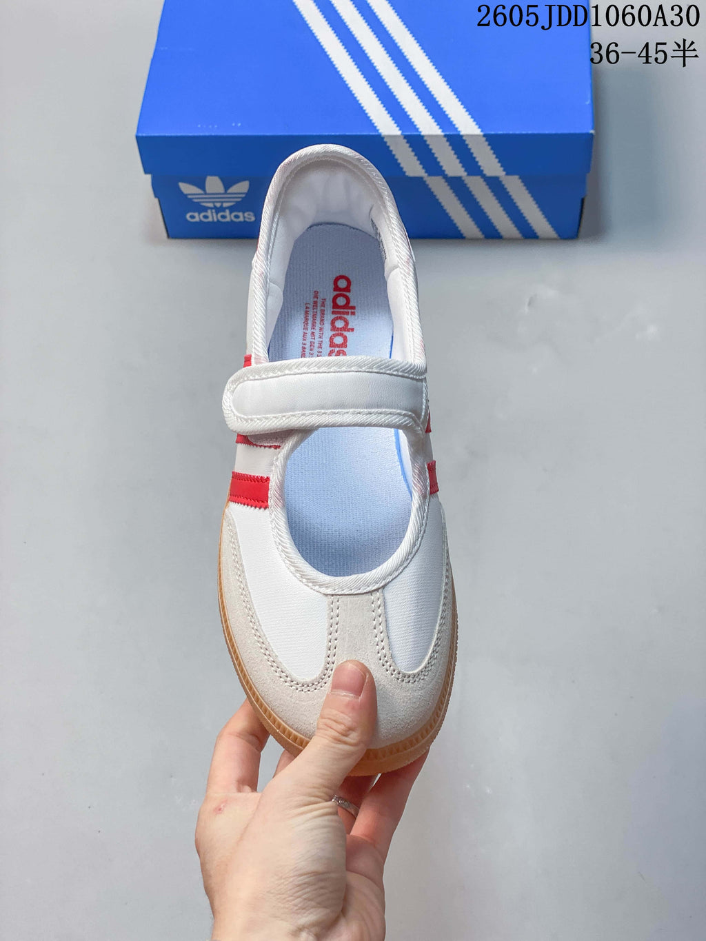Top view of the sneaker showing the instep strap and suede-look toe overlays