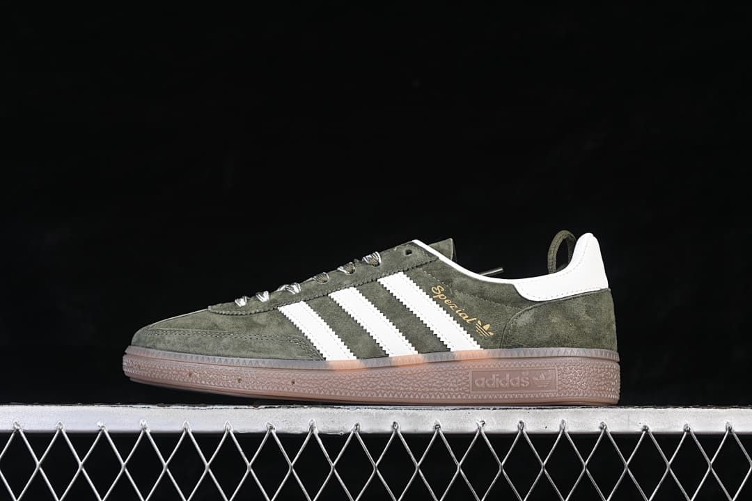 Side view of the sneaker showing green upper, white stripes, and gum-colored sole