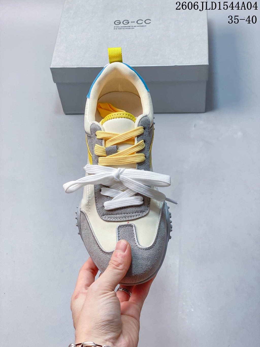 Top view highlighting the sneaker's layered toe panels and contrasting laces.