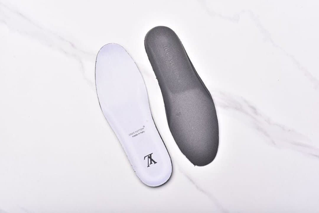 Two removable insoles shown separately