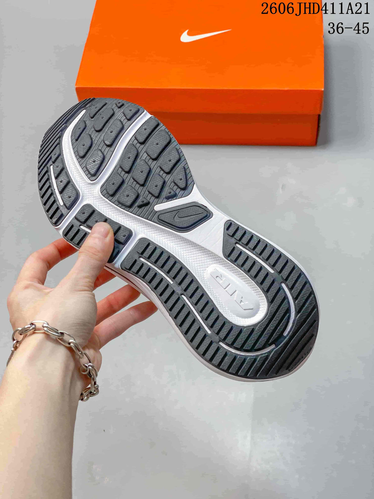 Close view of the dark gray shoe's patterned outsole with orange shoebox in the background; image label shows 36–45.