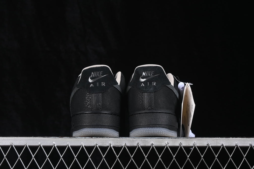 Rear view of the pair showing Nike Air heel branding and translucent-looking outsoles.