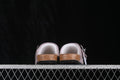 Rear view of lavender two-strap sandals showing the contoured footbed edge and black outsole.