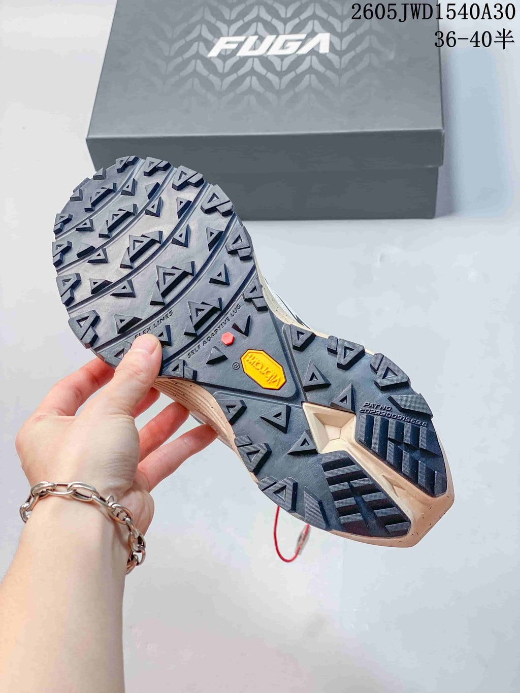 Close view of the lugged outsole on a KAILAS FUGA EX3 BOA shoe
