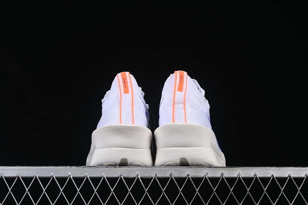 Rear view of the pair showing orange heel stripes