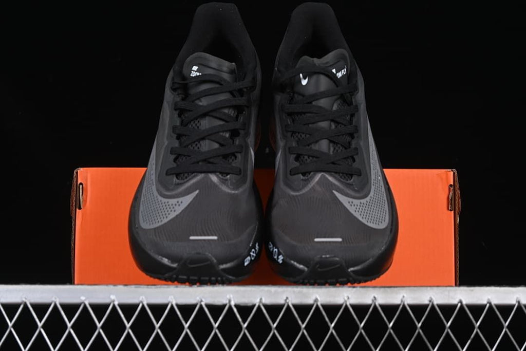 Front view of the pair placed on an orange shoe box
